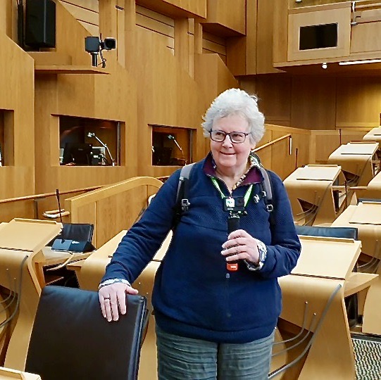 Marlene Halliday inside Holyrood Parliament Chamber. Three go to Holyrood.